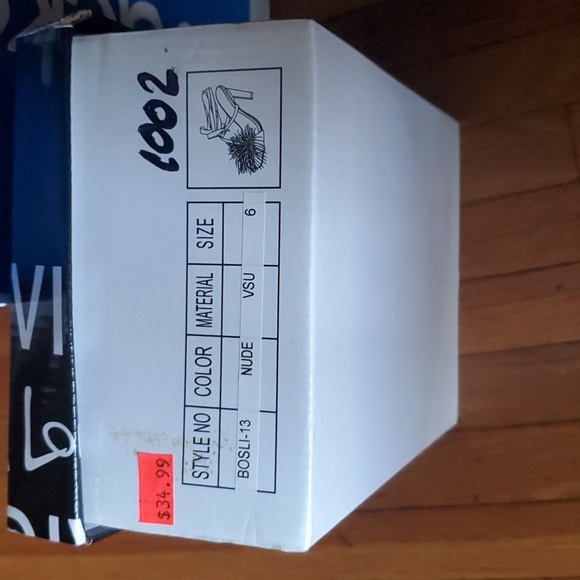 Fluffy faux feathers outline the top strap of this square-toed sandal with wrap- - Picture 7 of 7